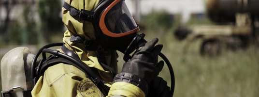 A firefighter in uniform. by Danil_Rudenko at Envato