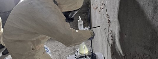 Man in PPE suit during field exercise 